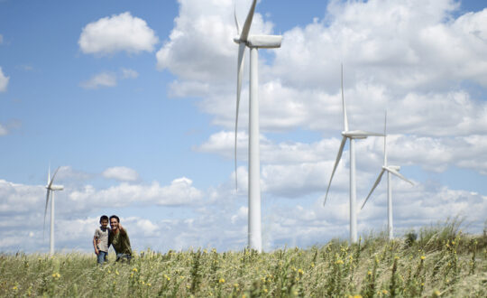 Father and son on a windfarm