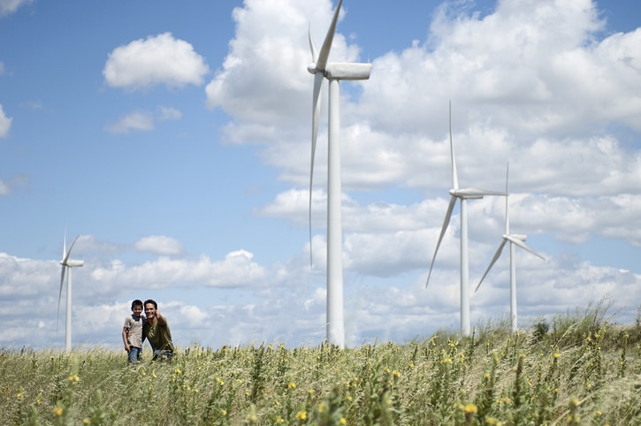 Father and son on a windfarm